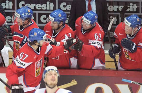 Czech Michael Frolic (#67) celebrates scoring against team Slovakia with his teammates during a semi-final game of the IIHF International Ice Hockey World Championship in Helsinki on May 19, 2012. (Photo by ALEXANDER NEMENOV/AFP/GettyImages)