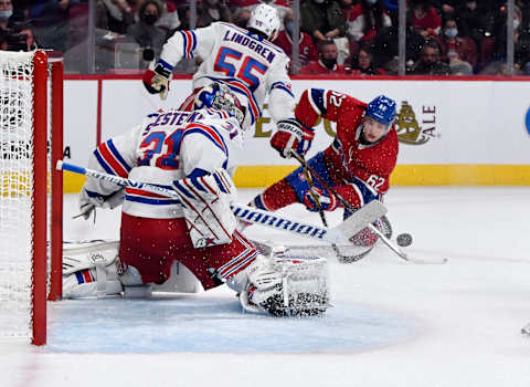 Oct 16, 2021; Montreal, Quebec, CAN; New York Rangers goalie Igor Shesterkin (31) makes a save against Montreal Canadiens forward Artturi Lehkonen (62) during the second period at the Bell Centre. Mandatory Credit: Eric Bolte-USA TODAY Sports