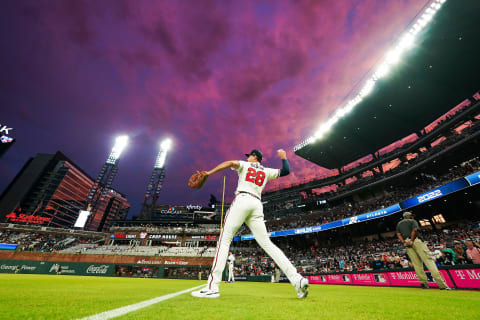 ATLANTA, GA – OCTOBER 12: Matt Olson #28 of the Atlanta Braves warms up as the the sun sets before game two of the National League Division Series at Truist Park on October 12, 2022 in Atlanta, Georgia. (Photo by Kevin D. Liles/Atlanta Braves/Getty Images)