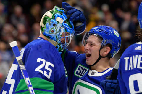 VANCOUVER, BC – OCTOBER 12: Vancouver Canucks Goaltender Jacob Markstrom (25) and Defenseman Troy Stecher (51) celebrate a win against the Philadelphia Flyers after their NHL game at Rogers Arena on October 12, 2019 in Vancouver, British Columbia, Canada. Vancouver won 3-2. (Photo by Derek Cain/Icon Sportswire via Getty Images)