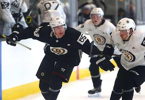 BOSTON – JUNE 28: Casey Dornbach chases a puck, pushing away Samuel Asselin during a scrimmage on Day 3 of a Boston Bruins development camp at Warrior Ice Arena in the Brighton neighborhood of Boston on June 28, 2019. (Photo by John Tlumacki/The Boston Globe via Getty Images)