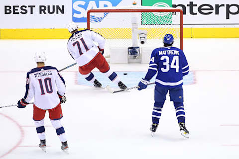 TORONTO, ONTARIO – AUGUST 09: Nick Foligno #71 of the Columbus Blue Jackets scores a empty net goal at 19:37 as Auston Matthews #34 of the Toronto Maple Leafs  . (Photo by Andre Ringuette/Freestyle Photo/Getty Images)