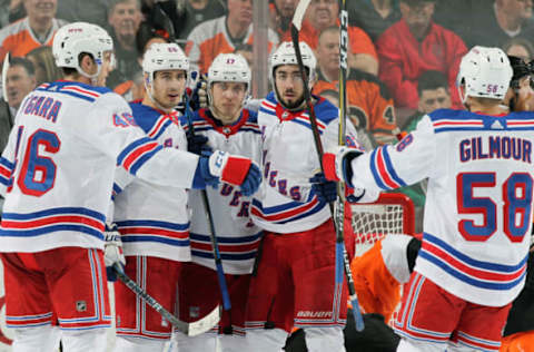 PHILADELPHIA, PA – MARCH 22: Jesper Fast #17 of the New York Rangers(center) celebrates his third period goal against the Philadelphia Flyers with Rob O’Gara #46, Chris Kreider #20, Mika Zibanejad #93, and John Gilmour #58 on March 22, 2018 at the Wells Fargo Center in Philadelphia, Pennsylvania. The Flyers went on to defeat the Rangers 4-3. (Photo by Len Redkoles/NHLI via Getty Images)