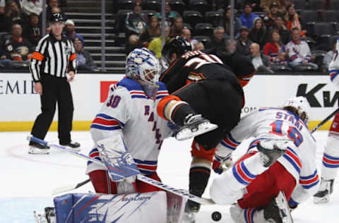 ANAHEIM, CALIFORNIA – DECEMBER 14: Henrik Lundqvist #30 and Marc Staal #18 of the New York Rangers defend against Sam Steel #34 of the Anaheim Ducks at the Honda Center on December 14, 2019, in Anaheim, California. The Ducks defeated the Rangers 4-3 in the shoot-out. (Photo by Bruce Bennett/Getty Images)