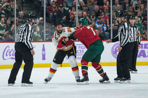 Nov 15, 2016; Saint Paul, MN, USA; Calgary Flames defenseman Deryk Engelland (29) fights Minnesota Wild forward Chris Stewart (7) at Xcel Energy Center. The Flames defeated the Wild 1-0. Mandatory Credit: Brace Hemmelgarn-USA TODAY Sports