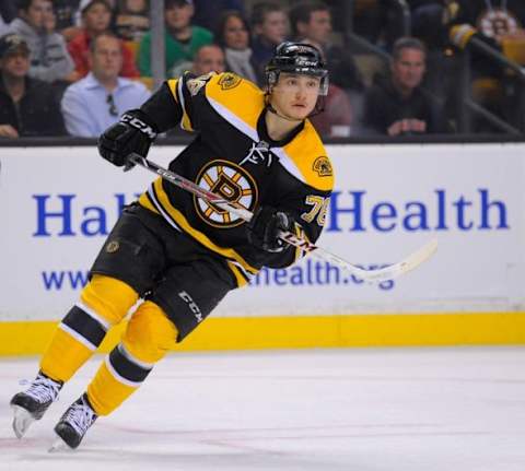 Sep 24, 2014; Boston, MA, USA; Boston Bruins center Alexander Khokhlachev (76) skates in the offensive zone during the second period against the Washington Capitals at TD Banknorth Garden. Mandatory Credit: Bob DeChiara-USA TODAY Sports