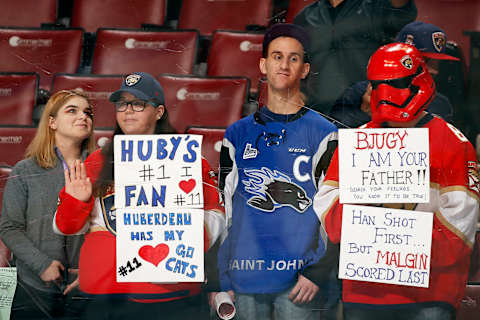 SUNRISE, FL – DECEMBER 1: Fans of Jonathan Huberdeau #11 and Nick Bjugstad #27 of the Florida Panthers have message for them prior to the start of the game against the San Jose Sharks at the BB&T Center on December 1, 2017 in Sunrise, Florida. (Photo by Eliot J. Schechter/NHLI via Getty Images)