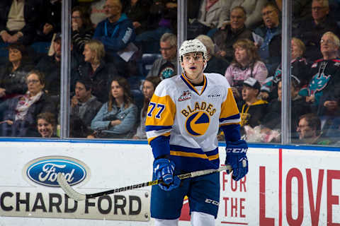 KELOWNA, BC – DECEMBER 01: Kirby Dach #77 of the Saskatoon Blades skates against the Kelowna Rockets at Prospera Place on December 1, 2018, in Kelowna, Canada. (Photo by Marissa Baecker/Getty Images)