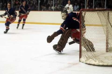 Goalie Ed Giacomin #1 of the New York Rangers makes the glove save . (Photo by Melchior DiGiacomo/Getty Images)