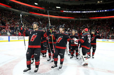 RALEIGH, NC – JANUARY 11: Justin Williams #14 of the Carolina Hurricanes leads the team in a Storm Surge following an NHL game against the Buffalo Sabres on January 11 ,2019 at PNC Arena in Raleigh, North Carolina. (Photo by Gregg Forwerck/NHLI via Getty Images)