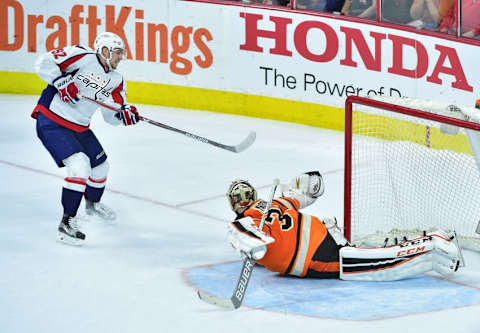 Mar 30, 2016; Philadelphia, PA, USA; Philadelphia Flyers goalie Steve Mason (35) makes a save against Washington Capitals center Evgeny Kuznetsov (92) during the shootout at Wells Fargo Center. The Flyers defeated the Capitals, 2-1 in a shootout. Mandatory Credit: Eric Hartline-USA TODAY Sports