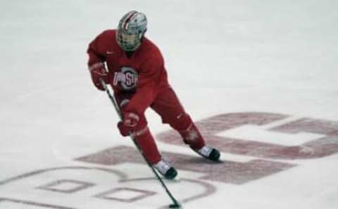 Ohio State forward Georgii Merkulov (10) gathers the puck and looks to pass during practice at Value City Arena in Columbus, Ohio on January 5, 2022.Ceb Osu Mhck Kwr 02