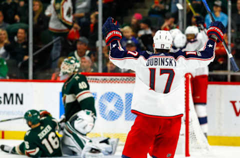 ST. PAUL, MN – OCTOBER 14: Columbus Blue Jackets center Brandon Dubinsky (17) celebrates after center Alexander Wennberg (10) scored the game winning goal in overtime during the regular season game between the Columbus Blue Jackets and the Minnesota Wild on October 14, 2017 at Xcel Energy Center in St. Paul, Minnesota. The Blue Jackets defeated the Wild 5-4 in overtime. (Photo by David Berding/Icon Sportswire via Getty Images)