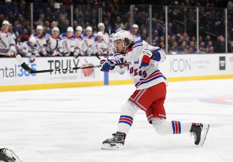 UNIONDALE, NEW YORK – JANUARY 16: Artemi Panarin #10 of the New York Rangers takes the first period shot against the New York Islanders at NYCB Live’s Nassau Coliseum on January 16, 2020 in Uniondale, New York. (Photo by Bruce Bennett/Getty Images)