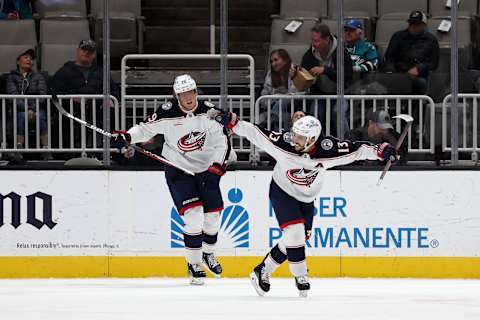 SAN JOSE, CALIFORNIA – MARCH 14: Johnny Gaudreau #13 and Patrik Laine #29 of the Columbus Blue Jackets celebrate after Gaudreau scored the winning goal against the San Jose Sharks in overtime at SAP Center on March 14, 2023 in San Jose, California. (Photo by Ezra Shaw/Getty Images)