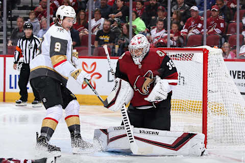 GLENDALE, ARIZONA – OCTOBER 10: Goaltender Darcy Kuemper #35 of the Arizona Coyotes makes a save on a shot as Cody Glass #9 of the Vegas Golden Knights skates in during the second period of the NHL game at Gila River Arena on October 10, 2019 in Glendale, Arizona. (Photo by Christian Petersen/Getty Images)