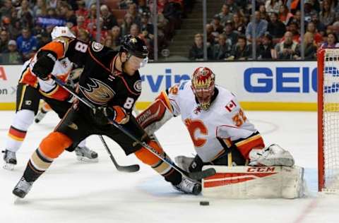 Mar 30, 2016; Anaheim, CA, USA; Calgary Flames goalie Niklas Backstrom (32) makes a save on a shot by Anaheim Ducks left wing Jamie McGinn (88) in the second period of the game at Honda Center. Mandatory Credit: Jayne Kamin-Oncea-USA TODAY Sports