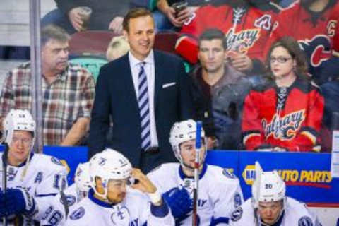 Jan 5, 2016; Calgary, Alberta, CAN; Tampa Bay Lightning head coach Jon Cooper on his bench against the Calgary Flames during the first period at Scotiabank Saddledome. Mandatory Credit: Sergei Belski-USA TODAY Sports