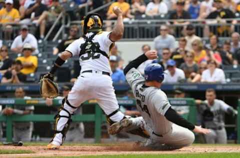 PITTSBURGH, PA – MAY 28: Anthony Rizzo #44 of the Chicago Cubs is forced out at home plate as he slides into the feet of Elias Diaz #32 of the Pittsburgh Pirates in the eighth inning during the game at PNC Park on May 28, 2018 in Pittsburgh, Pennsylvania. MLB players across the league are wearing special uniforms to commemorate Memorial Day. (Photo by Justin Berl/Getty Images)