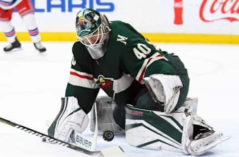 ST. PAUL, MN – FEBRUARY 13: Minnesota Wild Goalie Devan Dubnyk (40) makes a save during a NHL game between the Minnesota Wild and New York Rangers on February 13, 2018 at Xcel Energy Center in St. Paul, MN. The Wild defeated the Rangers 3-2.(Photo by Nick Wosika/Icon Sportswire via Getty Images)