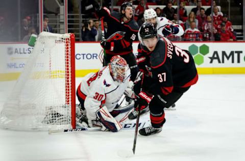 RALEIGH, NC – JANUARY 3: Andrei Svechnikov #37 of the Carolina Hurricanes skates near the crease as Ilya Samsonov #30 of the Washington Capitals protects the net during an NHL game on January 3, 2020, at PNC Arena in Raleigh, North Carolina. (Photo by Gregg Forwerck/NHLI via Getty Images)