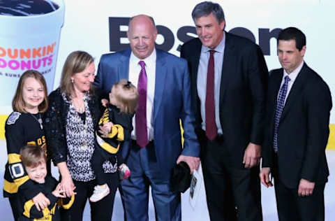 BOSTON, MA – MARCH 24: Claude Julien of the Boston Bruins, center, with wife Karen and daughters Katryna Chanel and Madyson, and son Zachary is honored by Don Sweeney, General Manager of the Bruins, right, and Cam Neely, President of the Bruins, second from right, as the coach with the most wins in franchise history with 388 before the game against the Florida Panthers at TD Garden on March 24, 2016 in Boston, Massachusetts. (Photo by Maddie Meyer/Getty Images)