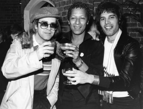 Elton John, Peter Straker, and Freddie Mercury captured on a night out in 1977.