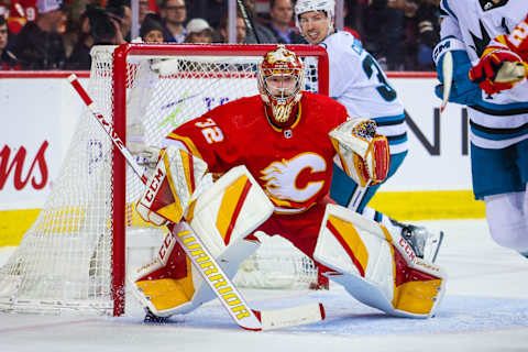 Apr 12, 2023; Calgary, Alberta, CAN; Calgary Flames goaltender Dustin Wolf (32) guards his net against the San Jose Sharks during the first period at Scotiabank Saddledome. Mandatory Credit: Sergei Belski-USA TODAY Sports