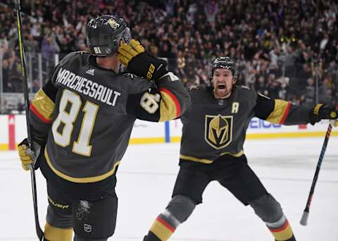 LAS VEGAS, NEVADA – FEBRUARY 13: Mark Stone #61 and Jonathan Marchessault #81 of the Vegas Golden Knights react after Stone assisted Marchessault on a power-play goal in overtime to defeat the St. Louis Blues 6-5 during their game at T-Mobile Arena on February 13, 2020 in Las Vegas, Nevada. (Photo by Ethan Miller/Getty Images)