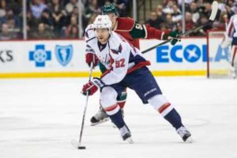 Feb 11, 2016; Saint Paul, MN, USA; Washington Capitals forward Evgeny Kuznetsov (92) against the Minnesota Wild at Xcel Energy Center. The Capitals defeated the Wild 4-3. Mandatory Credit: Brace Hemmelgarn-USA TODAY Sports