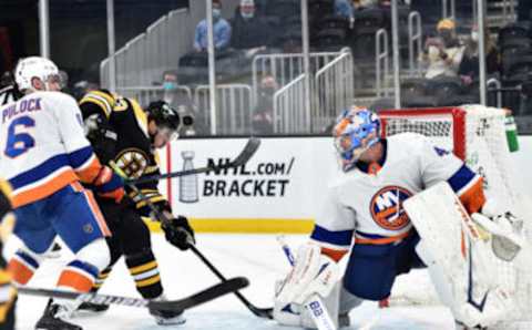 May 10, 2021; Boston, Massachusetts, USA; Boston Bruins center Brad Marchand (63) scores a goal past New York Islanders goaltender Semyon Varlamov (40) during the second period at TD Garden. Mandatory Credit: Bob DeChiara-USA TODAY Sports