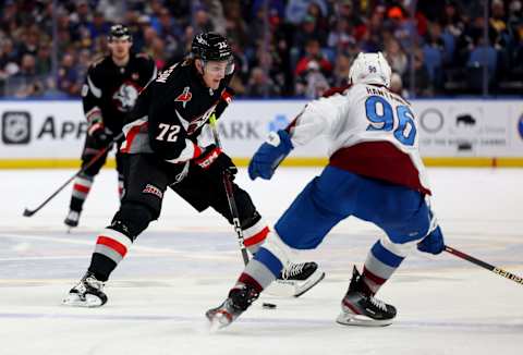 Oct 29, 2023; Buffalo, New York, USA; Buffalo Sabres right wing Tage Thompson (72) carries the puck as Colorado Avalanche right wing Mikko Rantanen (96) defends during the second period at KeyBank Center. Mandatory Credit: Timothy T. Ludwig-USA TODAY Sports