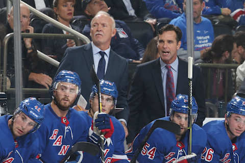 NEW YORK, NY – OCTOBER 04: Head coach David Quinn and assistant coach Lindy Ruff of the New York Rangers look on from the bench during the game against the Nashville Predators at Madison Square Garden on October 4, 2018 in New York City. (Photo by Jared Silber/NHLI via Getty Images)