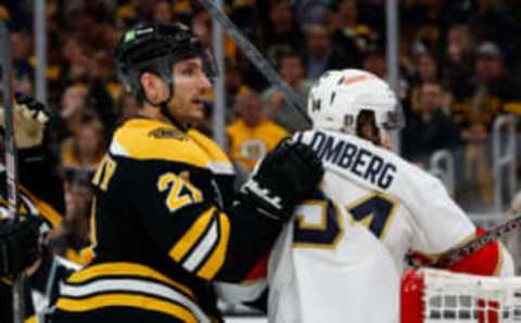 BOSTON, MASSACHUSETTS – APRIL 17: Garnet Hathaway #21 of the Boston Bruins grabs Ryan Lomberg #94 of the Florida Panthers during the second period of Game One of the First Round of the 2023 Stanley Cup Playoffs at the TD Garden on April 17, 2023, in Boston, Massachusetts. The Bruins won 3-1. (Photo by Richard T Gagnon/Getty Images)