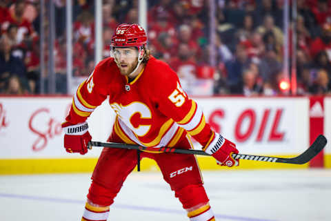 Apr 4, 2023; Calgary, Alberta, CAN; Calgary Flames defenseman Noah Hanifin (55) during the face off against the Chicago Blackhawks during the second period at Scotiabank Saddledome. Mandatory Credit: Sergei Belski-USA TODAY Sports