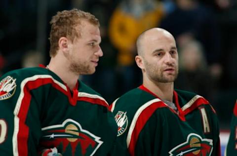 SAINT PAUL, MN – MARCH 6: Marian Gaborik #10 and Pavol Demitra #38 of the Minnesota Wild stand during the National Anthem prior to the game against the San Jose Sharks at Xcel Energy Center on March 6, 2007 in Saint Paul, Minnesota. The Sharks won 3-0. (Photo by Bruce Kluckhohn/Getty Images)