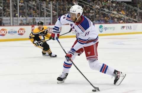 PITTSBURGH, PA – DECEMBER 20: K’Andre Miller #79 of the New York Rangers attempts a shot in the second period during the game against the Pittsburgh Penguins at PPG PAINTS Arena on December 20, 2022, in Pittsburgh, Pennsylvania. (Photo by Justin Berl/Getty Images)