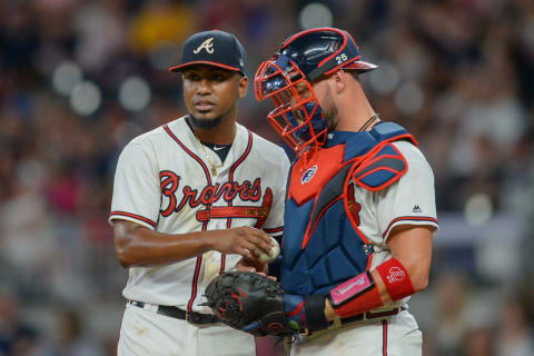 ATLANTA, GA SEPTEMBER 21: Atlanta starting pitcher Julio Teheran (left) and catcher Tyler Flowers (right) talk things over during the game between Atlanta and Philadelphia on September 21st, 2018 at SunTrust Park in Atlanta, GA. The Atlanta Braves came from behind to defeat the Philadelphia Phillies by a score of 6 to 5. (Photo by Rich von Biberstein/Icon Sportswire via Getty Images)