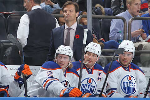 NEW YORK, NY – NOVEMBER 09: Head Coach Dallas Eakins of the Edmonton Oilers follows the action from the bench during the game against the New York Rangers at Madison Square Garden on November 9, 2014 in New York City. The Edmonton Oilers won 3-1. (Photo by Jared Silber/NHLI via Getty Images)