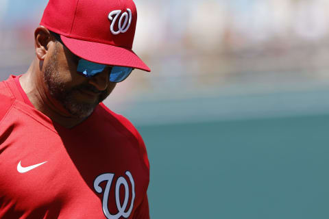 Jun 29, 2022; Washington, District of Columbia, USA; Washington Nationals manager Dave Martinez (4) walks back to the dugout after making a pitching change against the Pittsburgh Pirates during the fifth inning at Nationals Park. Mandatory Credit: Geoff Burke-USA TODAY Sports