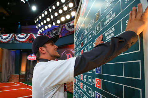 05 JUN 2014: Michael Chavis, SS who was picked 26th by the Boston Red Sox puts his name on the draft board during The 2014 MLB First-Year Player Draft puts his name on the Draft Board at MLB Network in Secaucus NJ. (Photo by Rich Graessle/Icon SMI/Corbis via Getty Images)