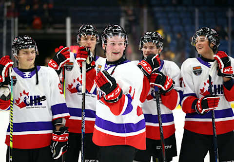 Alexis Lafreniere #11 of Team White laughs with teammates following the final whistle of the 2020 CHL/NHL Top Prospects Game against Team Red. (Photo by Vaughn Ridley/Getty Images)