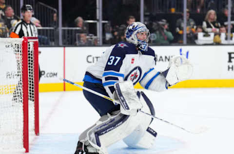 LAS VEGAS, NEVADA – APRIL 20: Connor Hellebuyck #37 of the Winnipeg Jets tends net during the second period against the Vegas Golden Knights in Game Two of the First Round of the 2023 Stanley Cup Playoffs at T-Mobile Arena on April 20, 2023 in Las Vegas, Nevada. (Photo by Chris Unger/Getty Images)