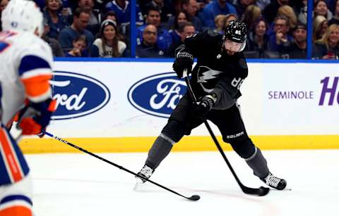 Feb 8, 2020; Tampa, Florida, USA; Tampa Bay Lightning right wing Nikita Kucherov (86) passes the puck against the New York Islanders during the first period at Amalie Arena. Mandatory Credit: Kim Klement-USA TODAY Sports