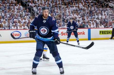 WINNIPEG, MB – APRIL 18: Kevin Hayes #12 of the Winnipeg Jets keeps an eye on the play during second period action against the St. Louis Blues in Game Five of the Western Conference First Round during the 2019 NHL Stanley Cup Playoffs at the Bell MTS Place on April 18, 2019 in Winnipeg, Manitoba, Canada. The Blues defeated the Jets 3-2 to lead the series 3-2. (Photo by Jonathan Kozub/NHLI via Getty Images)