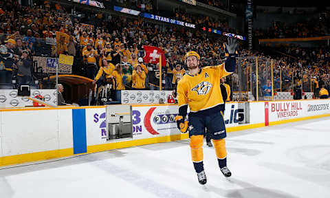 NASHVILLE, TN – FEBRUARY 13: Filip Forsberg #9 of the Nashville Predators waves to the crowd after his overtime game winning penalty shot against the St. Louis Blues during an NHL game at Bridgestone Arena on February 13, 2018 in Nashville, Tennessee. (Photo by John Russell/NHLI via Getty Images)