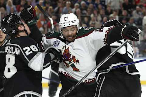 Arizona Coyotes’ #24 Matt Dumba scuffles with Los Angeles Kings’ #28 Jaret Anderson-Dolan (Photo by MARTIN KEEP/AFP via Getty Images)