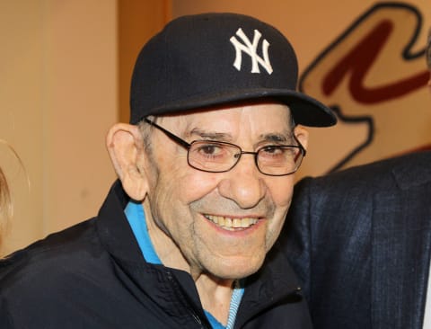 LITTLE FALLS, NJ – OCTOBER 24: (EXCLUSIVE COVERAGE) Yogi Berra poses at Yogi’s annual World Series viewing party while meeting the cast of Broadway’s ‘Bronx Bombers’ at Yogi Berra Museum & Learning Center on October 24, 2013, in Little Falls, New Jersey. (Photo by Bruce Glikas/FilmMagic)