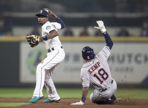 SEATTLE, WA – AUGUST 21: Second baseman Dee Gordon #9 of the Seattle Mariners turns a double play forcing out Tony Kemp #18 of the Houston Astros at second base on a ball hit by Alex Bregman #2 of the Houston Astros during the fifth inning of a game at Safeco Field on August 21, 2018 in Seattle, Washington. (Photo by Stephen Brashear/Getty Images)