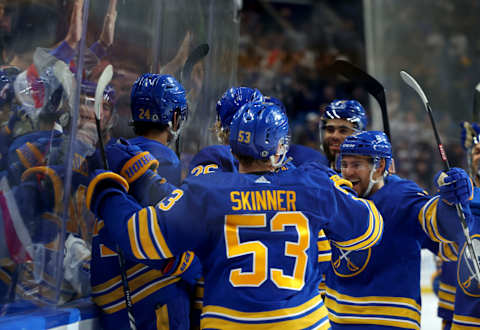 Oct 17, 2023; Buffalo, New York, USA; Buffalo Sabres center Dylan Cozens (24) celebrates his overtime goal with teammates against the Tampa Bay Lightning at KeyBank Center. Mandatory Credit: Timothy T. Ludwig-USA TODAY Sports